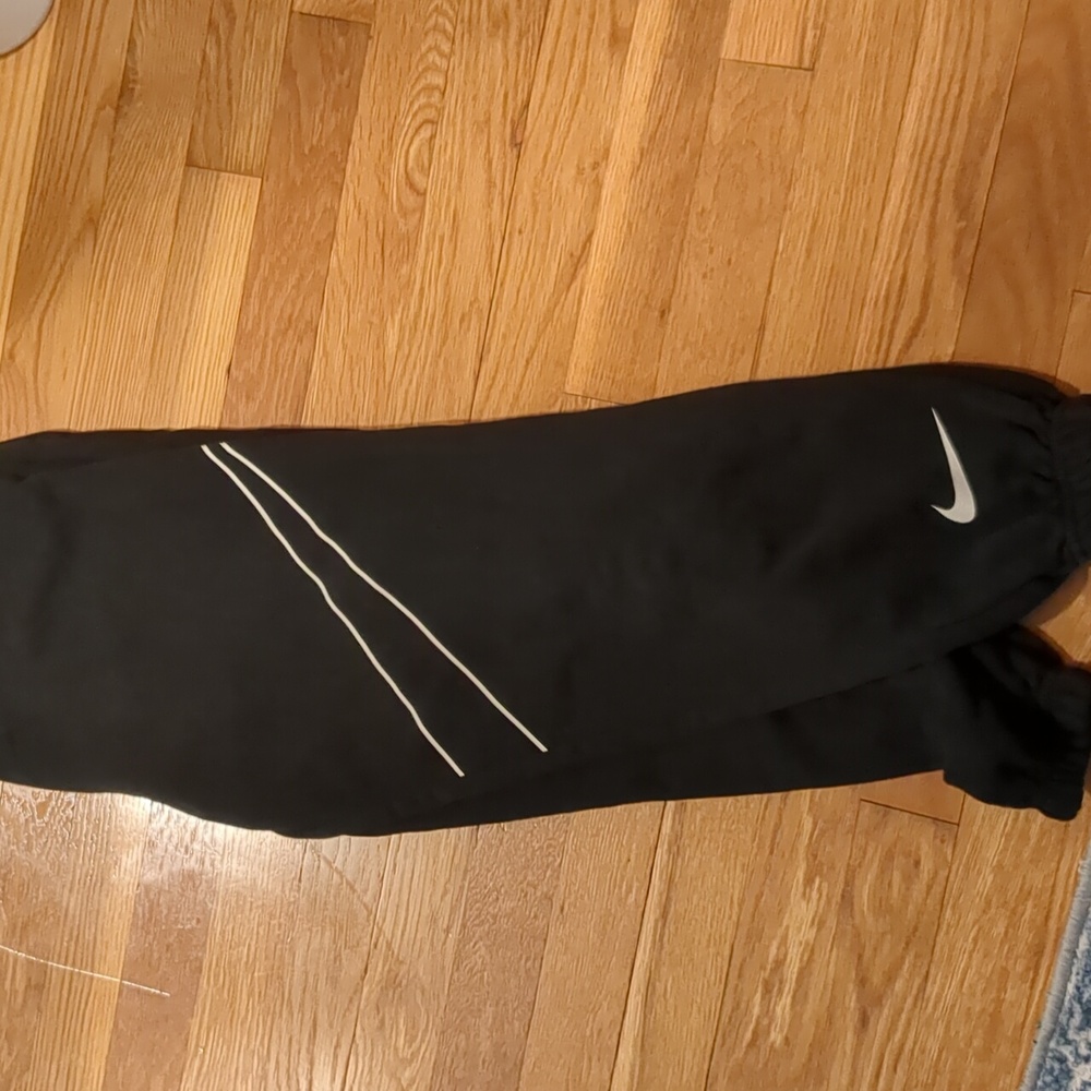 Girls Nike joggers.